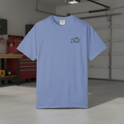 Light blue t-shirt with 'Girl Dad' text in a garage setting