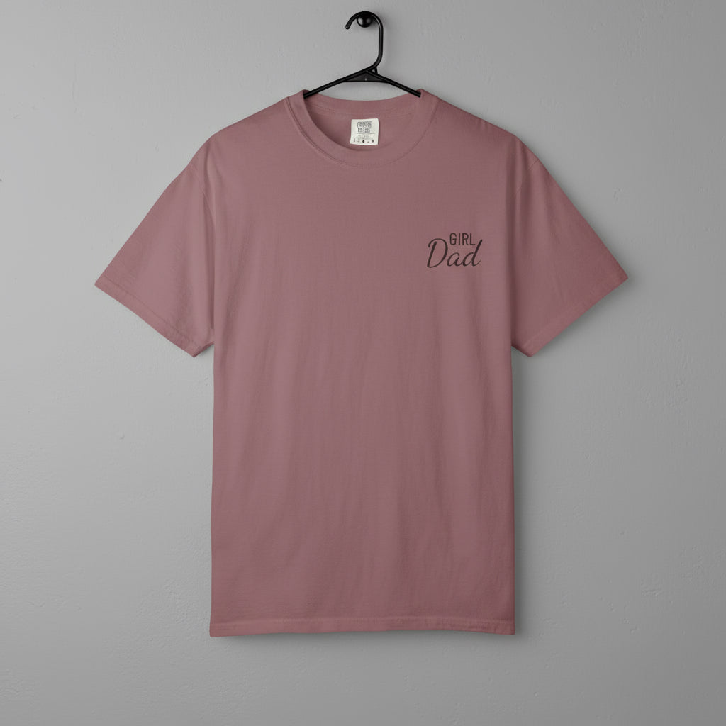 Mauve t-shirt with 'Girl Dad' text on a gray background