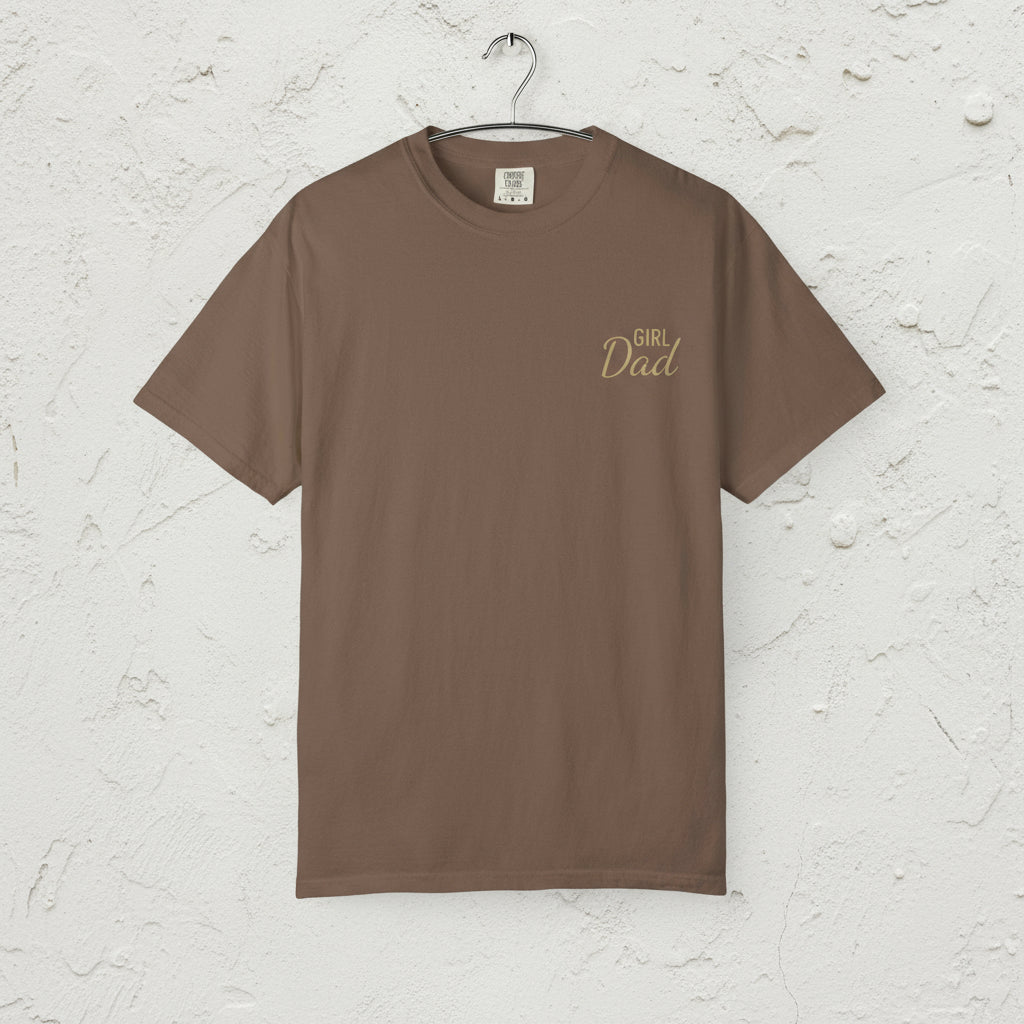 Brown t-shirt with 'Girl Dad' text on a white background