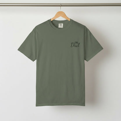 Green t-shirt with 'Girl Dad' text on a hanger against a white background